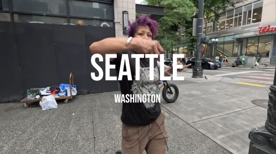 The Seattle chapter title over a street scene in Nick Shirley’s video.